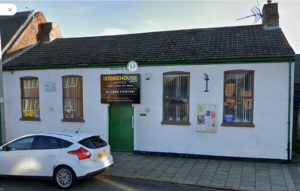 Access centre, west street, Alford - white building with green door